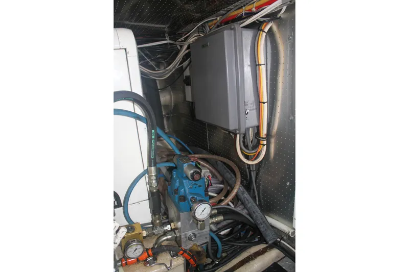 Slide: The Image of Engine room of 1999 Grand Alaskan Pilothouse with hydraulic and electrical systems. - 145