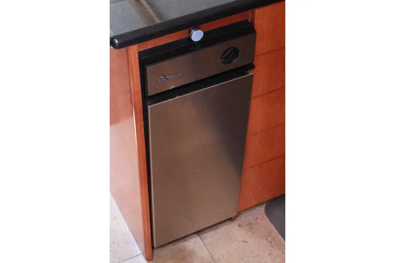 Slide: The Image of Stainless steel appliance in a 1999 Grand Alaskan Pilothouse kitchen interior. - 182
