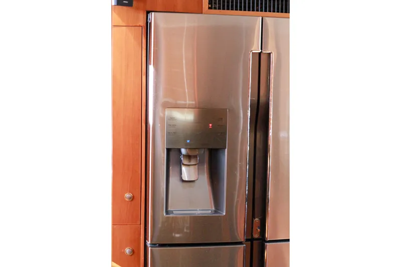 Slide: The Image of Stainless steel refrigerator with water dispenser on a Grand Alaskan Pilothouse yacht, 1999 model. - 183