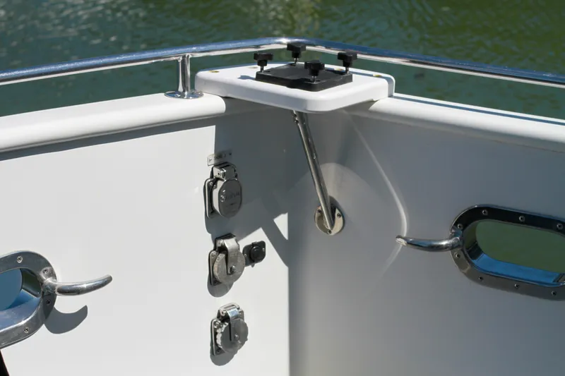 Slide: The Image of 1999 Grand Alaskan Pilothouse boat deck with railing and hardware details. - 85