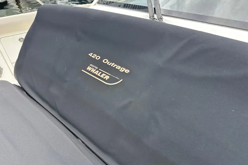 Slide: The Image of Boston Whaler 420 Outrage 2020 model boat cover with logo displayed. - 16