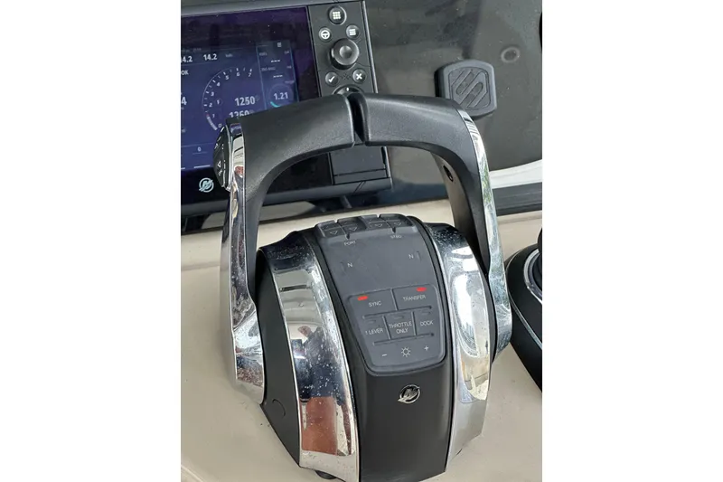 Slide: The Image of Throttle control panel of a 2020 Boston Whaler 420 Outrage boat. - 27