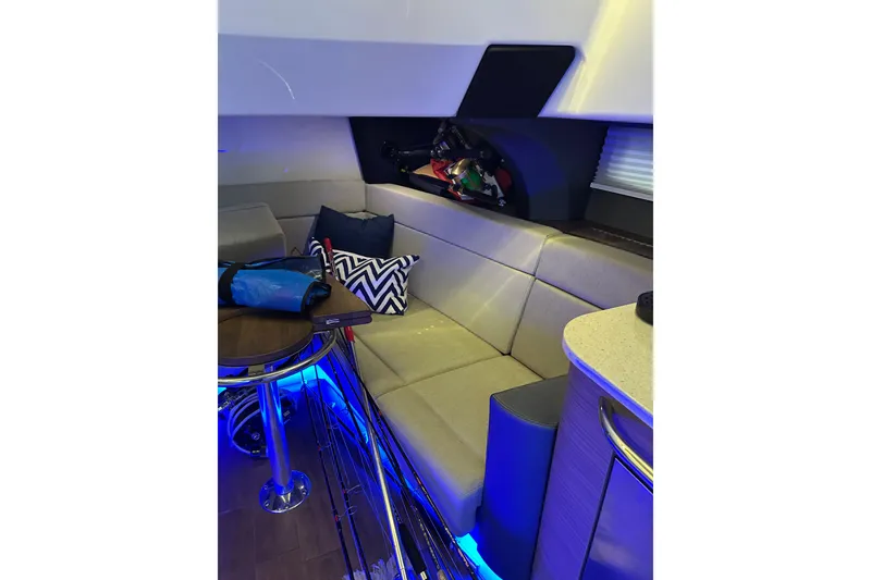 Slide: The Image of Luxurious interior of 2020 Boston Whaler 420 Outrage with ambient blue lighting. - 33