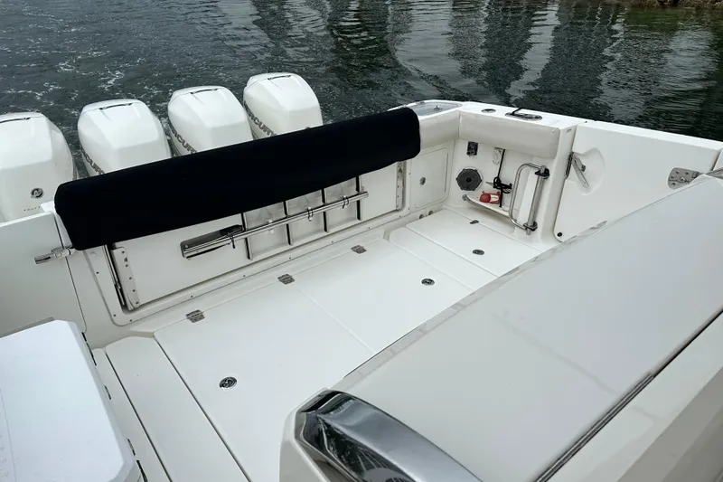 Slide: The Image of 2020 Boston Whaler 420 Outrage boat deck with four outboard engines. - 40