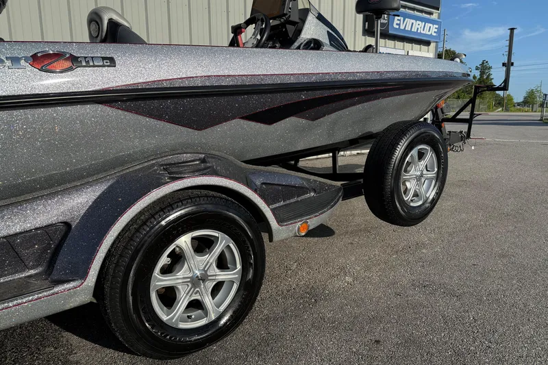 Slide: The Image of 2015 Ranger Z118 Comanche boat with metallic finish on a trailer. - 4