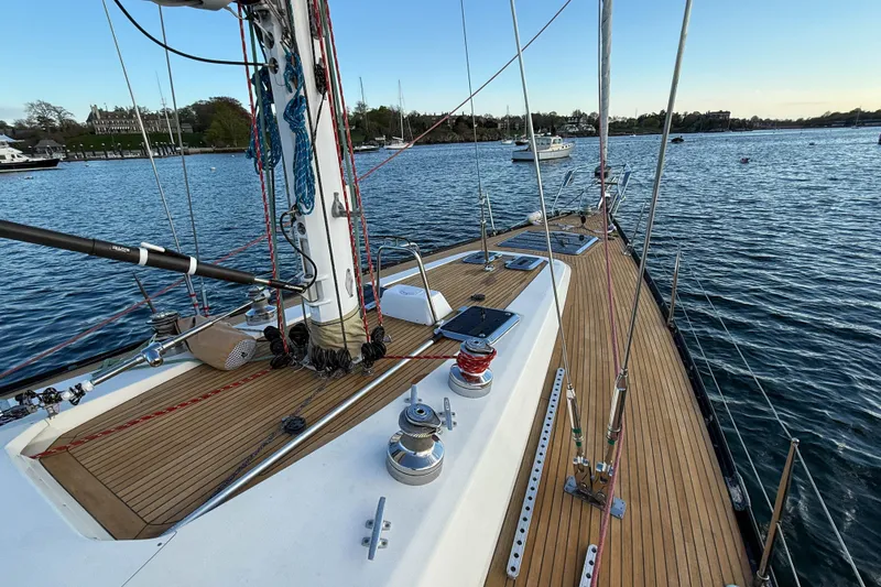 Slide: The Image of Sailing yacht Baltic 52, 1990 model, with teak deck on calm waters. - 55