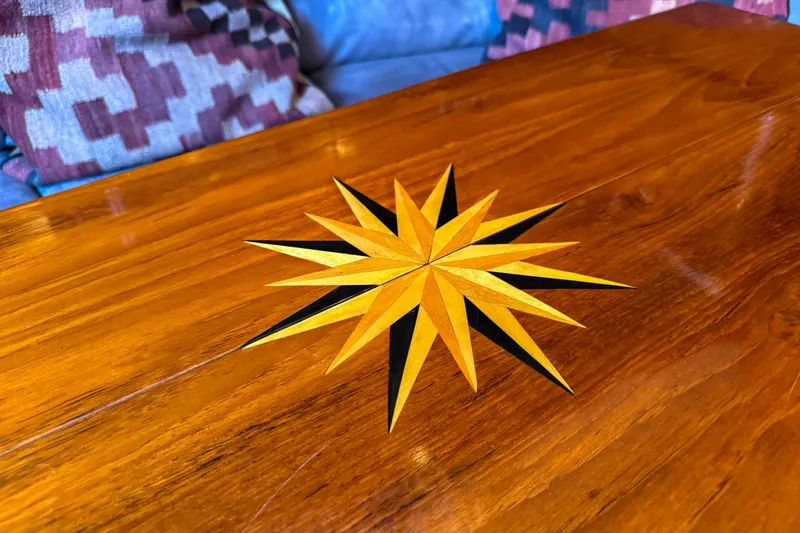 Slide: The Image of Wooden table with a star inlay design, Baltic 52, 1990 model. - 46