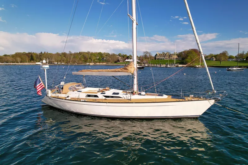 The Image of Sailing yacht Baltic 52, 1990 model, anchored in scenic waters with clear skies. - 0