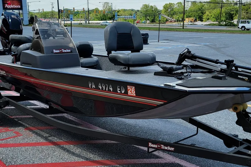 Slide: The Image of 2023 Tracker Bass Tracker Classic XL boat on trailer in parking lot. - 10