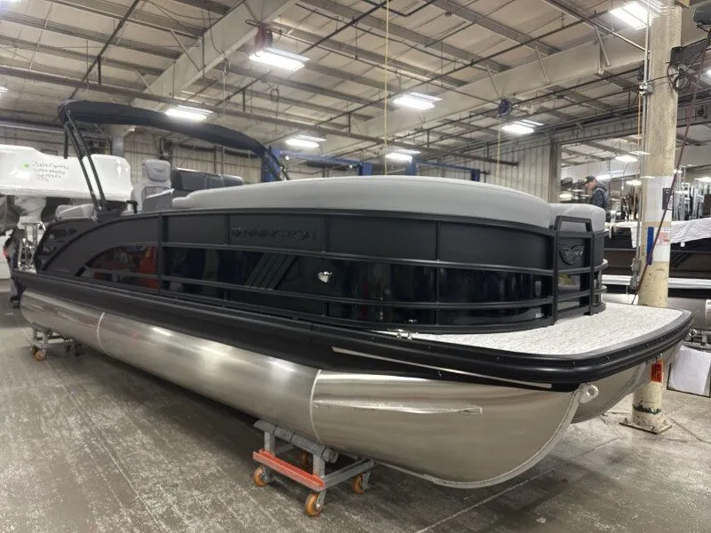 The Image of 2026 Bennington 24 M Stern Lounge pontoon boat in a factory setting. - 1