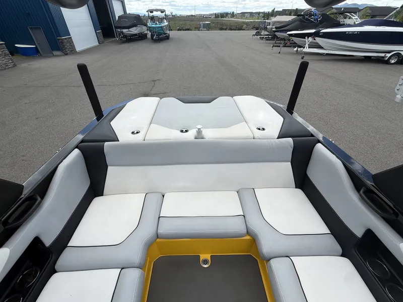 Slide: The Image of Interior of a 2018 Supreme S202 boat on a parking lot. - 16