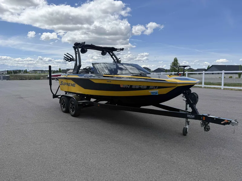 Slide: The Image of Yellow 2018 Supreme S202 boat on trailer. - 4