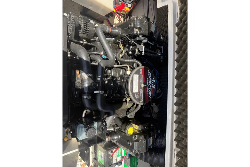 Slide: The Image of Engine compartment of a 2008 Tahoe Q5i Sport boat with Mercury 4.3L motor. - 4