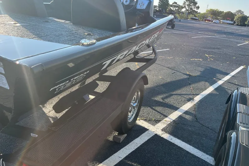 Slide: The Image of 2026 Tracker Pro Team 190 boat on trailer in parking lot. - 5