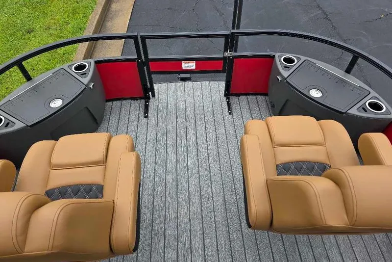 Slide: The Image of 2026 Ranger 220F boat interior with tan seats and gray flooring. - 8