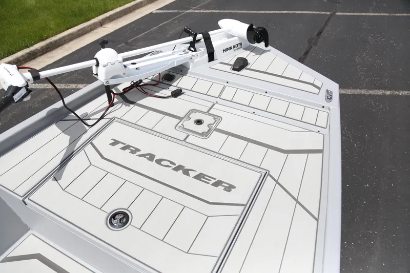 Slide: The Image of 2026 Tracker Bass Tracker Classic CC boat deck with Minn Kota trolling motor. - 2