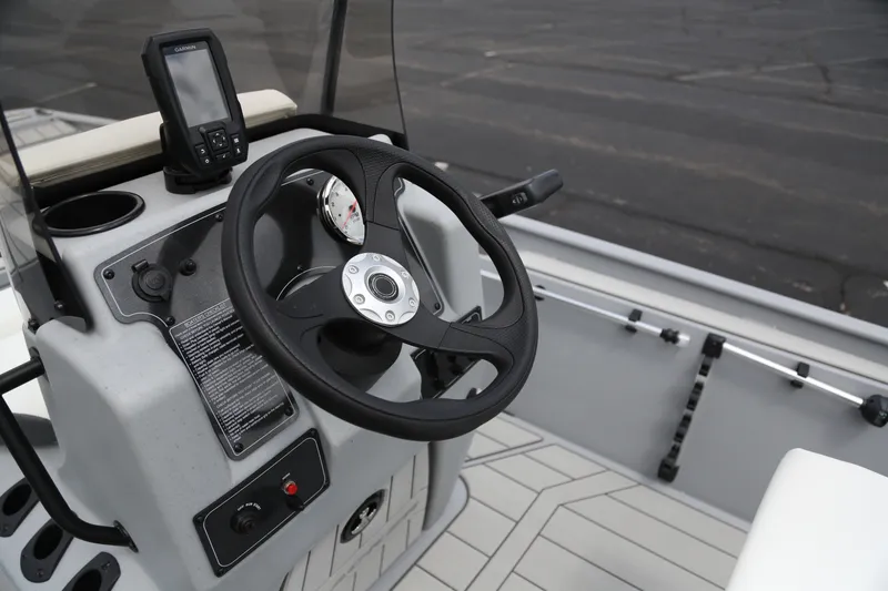 Slide: The Image of Steering console of 2026 Tracker Bass Tracker Classic CC boat with navigation system. - 5