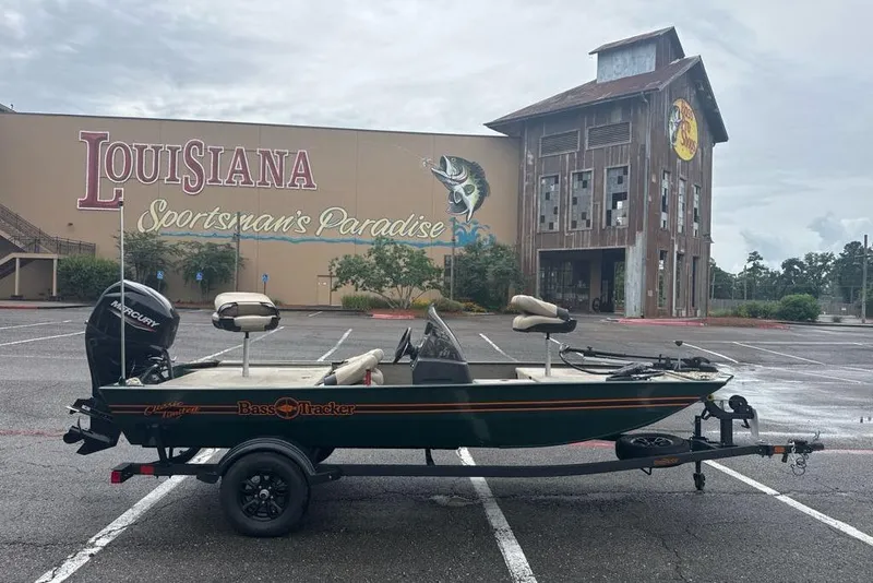 Slide: The Image of 2026 Tracker Bass Tracker Classic Limited boat parked at Louisiana Sportsman's Paradise. - 2
