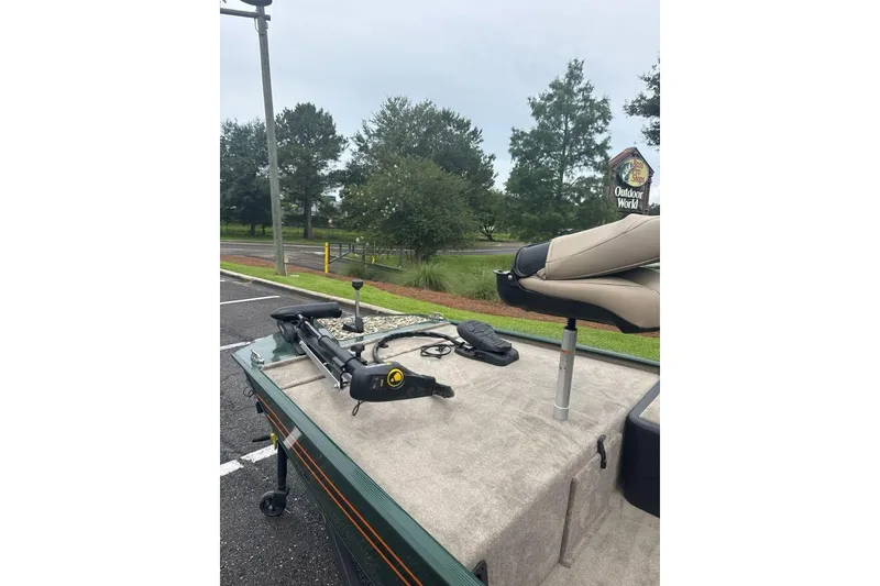 Slide: The Image of 2026 Tracker Bass Tracker Classic Limited boat at Outdoor World parking lot. - 4