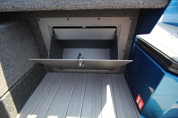Slide: The Image of Storage compartment in 2026 Vexus ADX 190 boat, featuring secure latch and sleek design. - 12