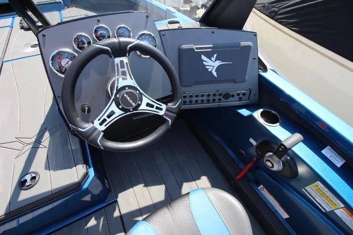 Slide: The Image of 2026 Vexus ADX 190 boat cockpit with steering wheel and control panel. - 8