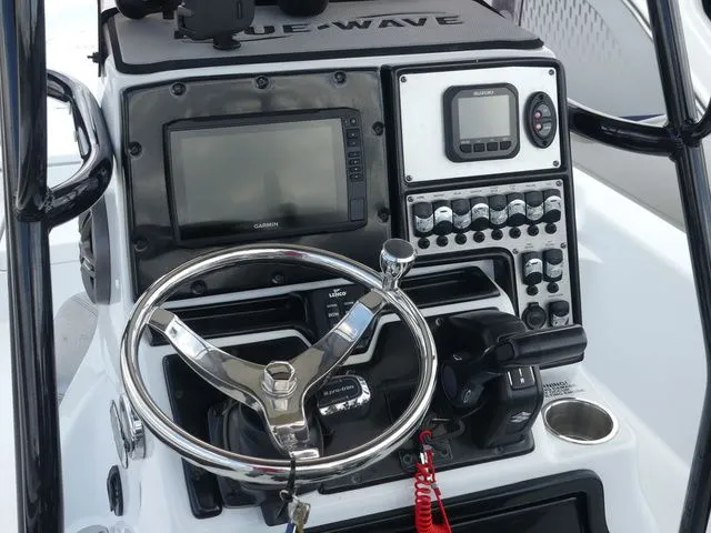 Slide: The Image of 2021 Blue Wave 2300 Pure Bay console with navigation system. - 17