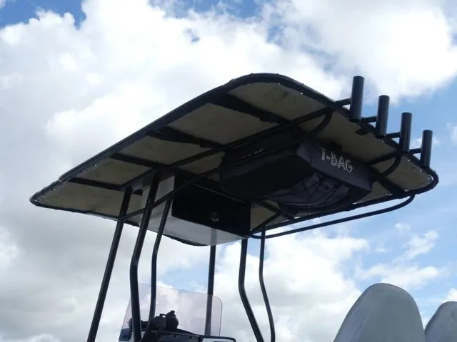 Slide: The Image of T-top on a 2021 Blue Wave 2300 Pure Bay boat. - 19
