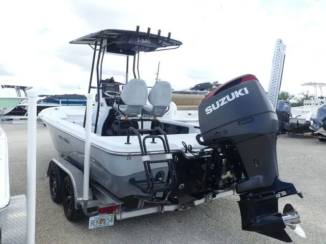 Slide: The Image of 2021 Blue Wave 2300 Pure Bay boat with Suzuki outboard motor. - 6