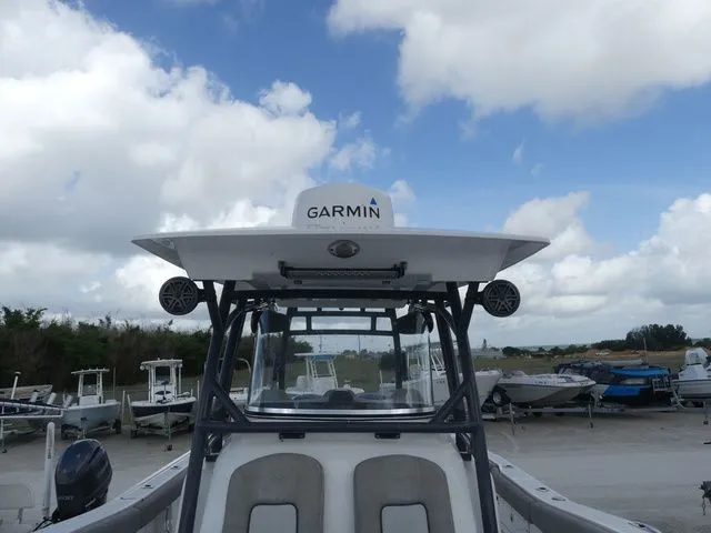Slide: The Image of Sea Fox 328 Commander 2021 with Garmin equipment outdoors. - 16
