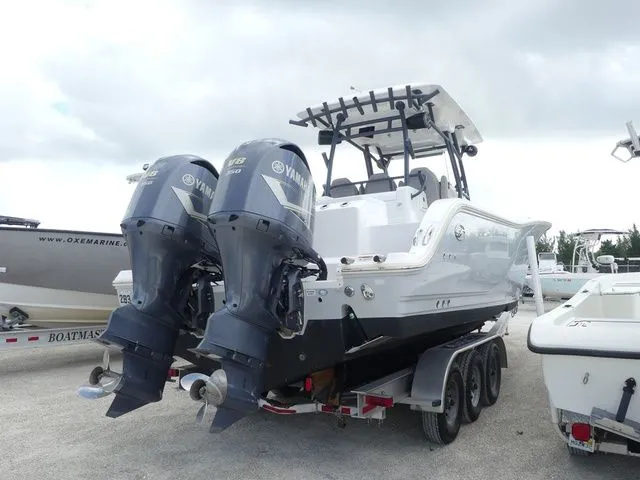 Slide: The Image of 2021 Sea Fox 328 Commander boat with Yamaha engines on trailer. - 4
