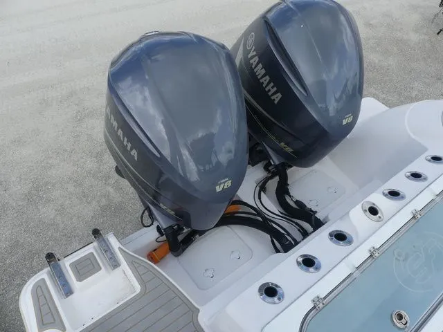 Slide: The Image of Two Yamaha V8 engines on a 2021 Sea Fox 328 Commander boat. - 49