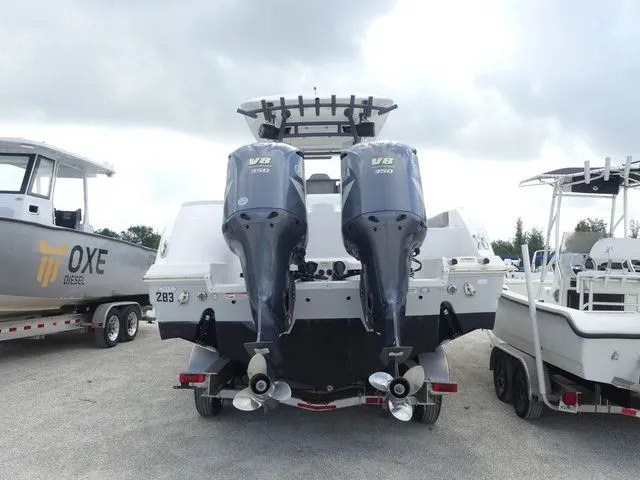 Slide: The Image of Rear view of a 2021 Sea Fox 328 Commander with twin V8 engines. - 5