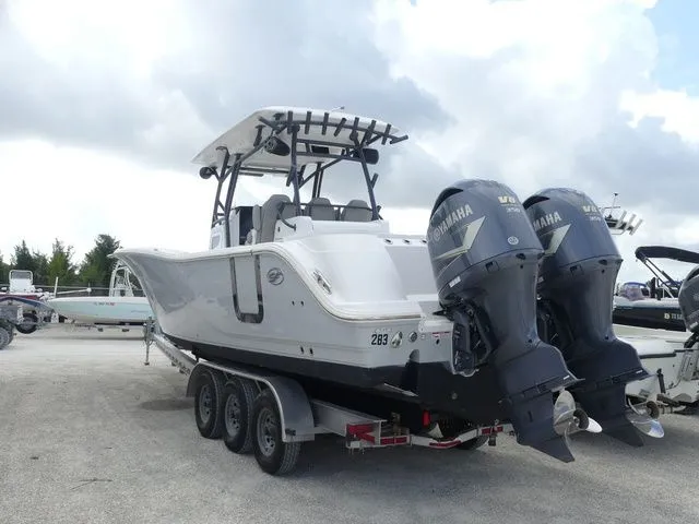 Slide: The Image of 2021 Sea Fox 328 Commander boat with twin Yamaha engines on trailer. - 6