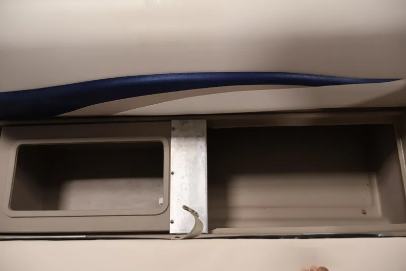 Slide: The Image of Storage compartments on a 2008 Sun Tracker Party Barge 24 DLX boat. - 15