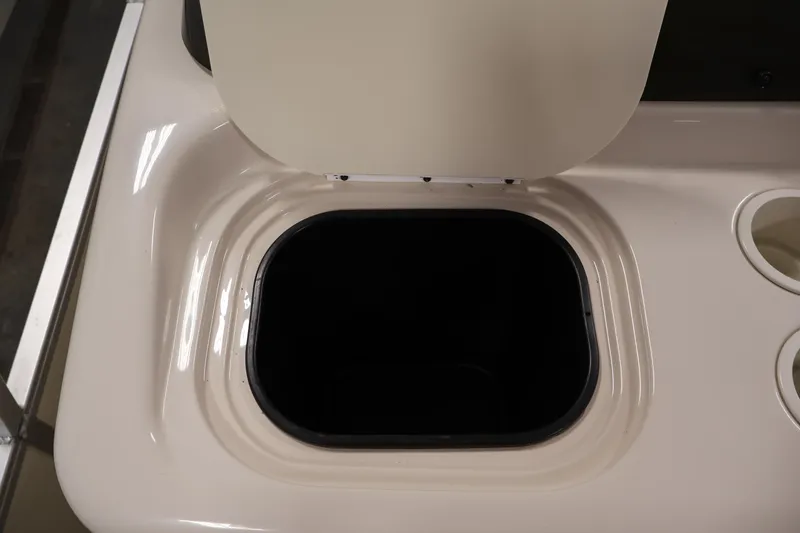 Slide: The Image of Open storage compartment on 2008 Sun Tracker Party Barge 24 DLX boat. - 22