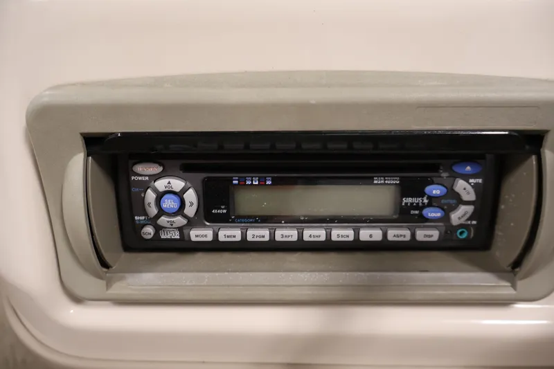 Slide: The Image of Stereo system on a 2008 Sun Tracker Party Barge 24 DLX boat dashboard. - 29