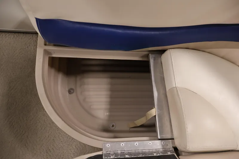 Slide: The Image of Sun Tracker Party Barge 24 DLX 2008 seat storage compartment, open with visible interior. - 34