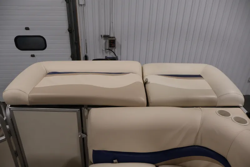 Slide: The Image of 2008 Sun Tracker Party Barge 24 DLX interior seating with beige upholstery. - 35