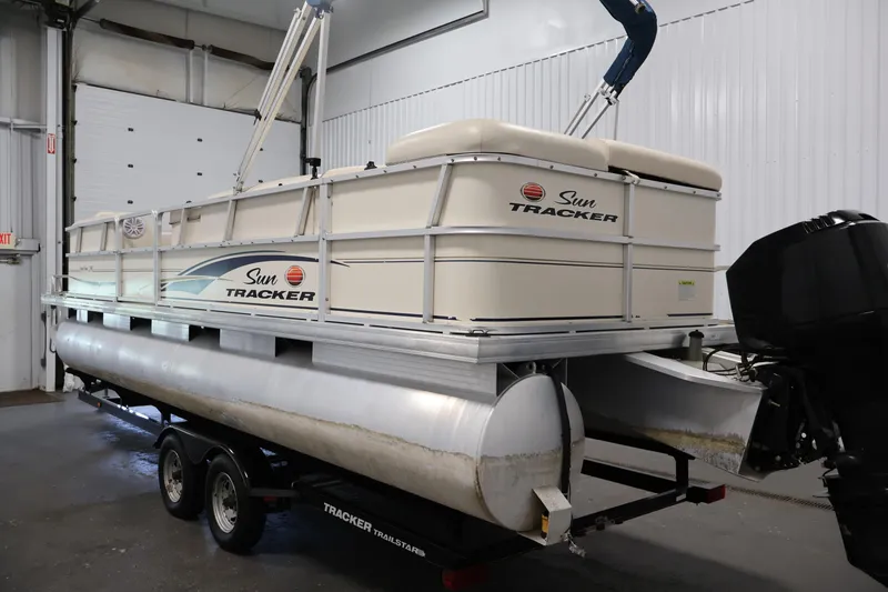 Slide: The Image of 2008 Sun Tracker Party Barge 24 DLX pontoon boat in indoor storage. - 4