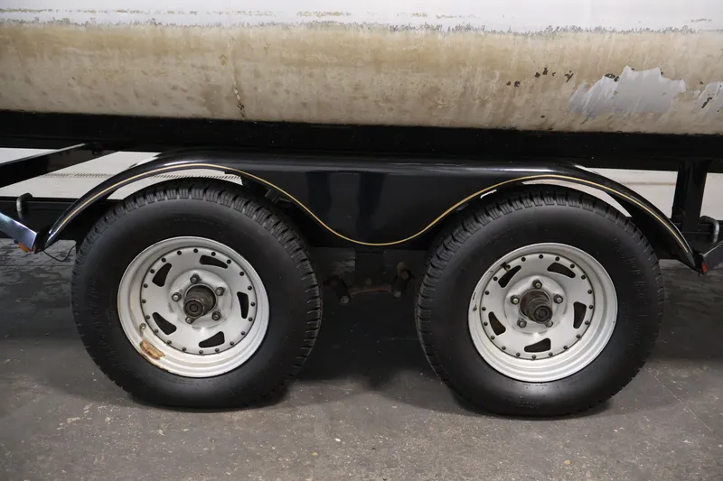 Slide: The Image of Trailer wheels of a 2008 Sun Tracker Party Barge 24 DLX pontoon boat. - 45
