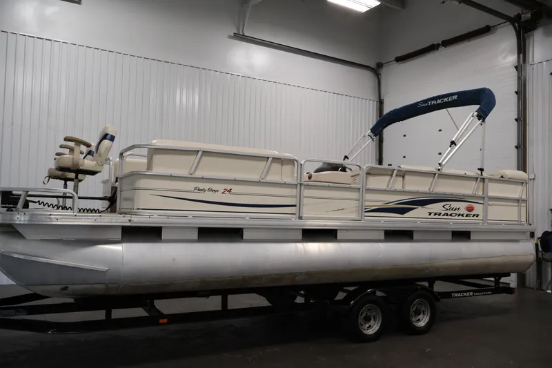 Slide: The Image of 2008 Sun Tracker Party Barge 24 DLX pontoon boat in indoor storage. - 5