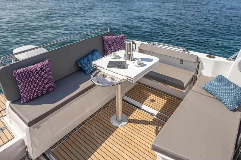 Slide: The Image of Beneteau Antares 8 2026, comfortable seating area on deck. - 5