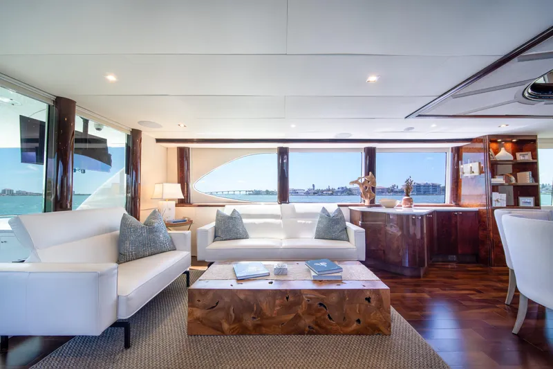 Slide: The Image of Luxurious interior of a 2001 Lazzara 94 yacht with elegant furnishings and ocean views. - 10