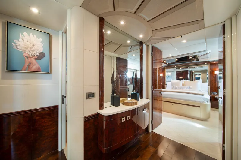 Slide: The Image of Luxurious interior of 2001 Lazzara 94 yacht featuring elegant bedroom and modern decor. - 21