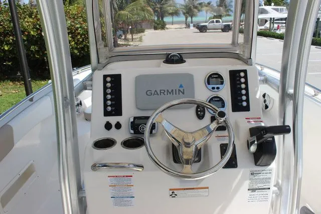 Slide: The Image of 2019 Robalo R222 boat helm with Garmin navigation system. - 14