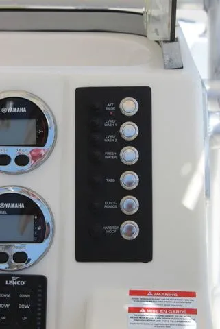 Slide: The Image of Dashboard of 2019 Robalo R222 boat with Yamaha controls. - 16