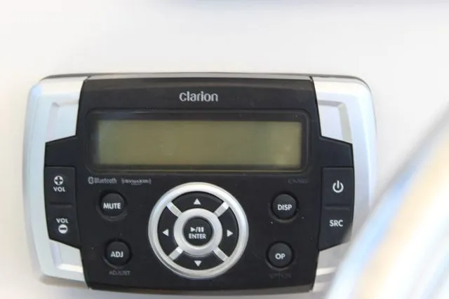Slide: The Image of Clarion audio panel in a 2019 Robalo R222 boat. - 19