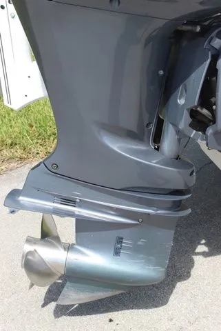 Slide: The Image of Outboard motor of a 2019 Robalo R222 boat, close-up. - 25
