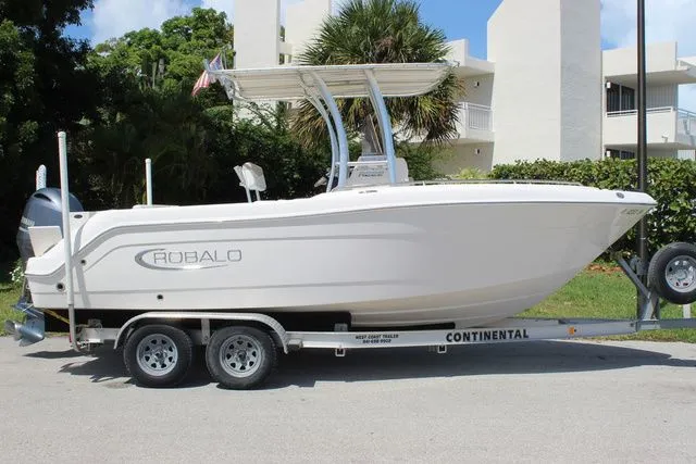 Slide: The Image of 2019 Robalo R222 boat on trailer, side view. - 5