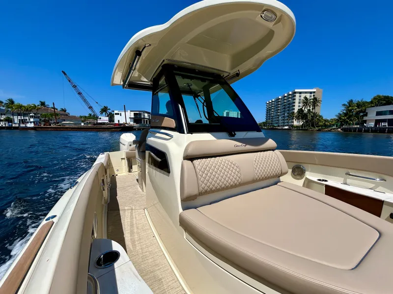 Slide: The Image of Chris-Craft Catalina 28 boat 2026 on water with blue sky. - 10